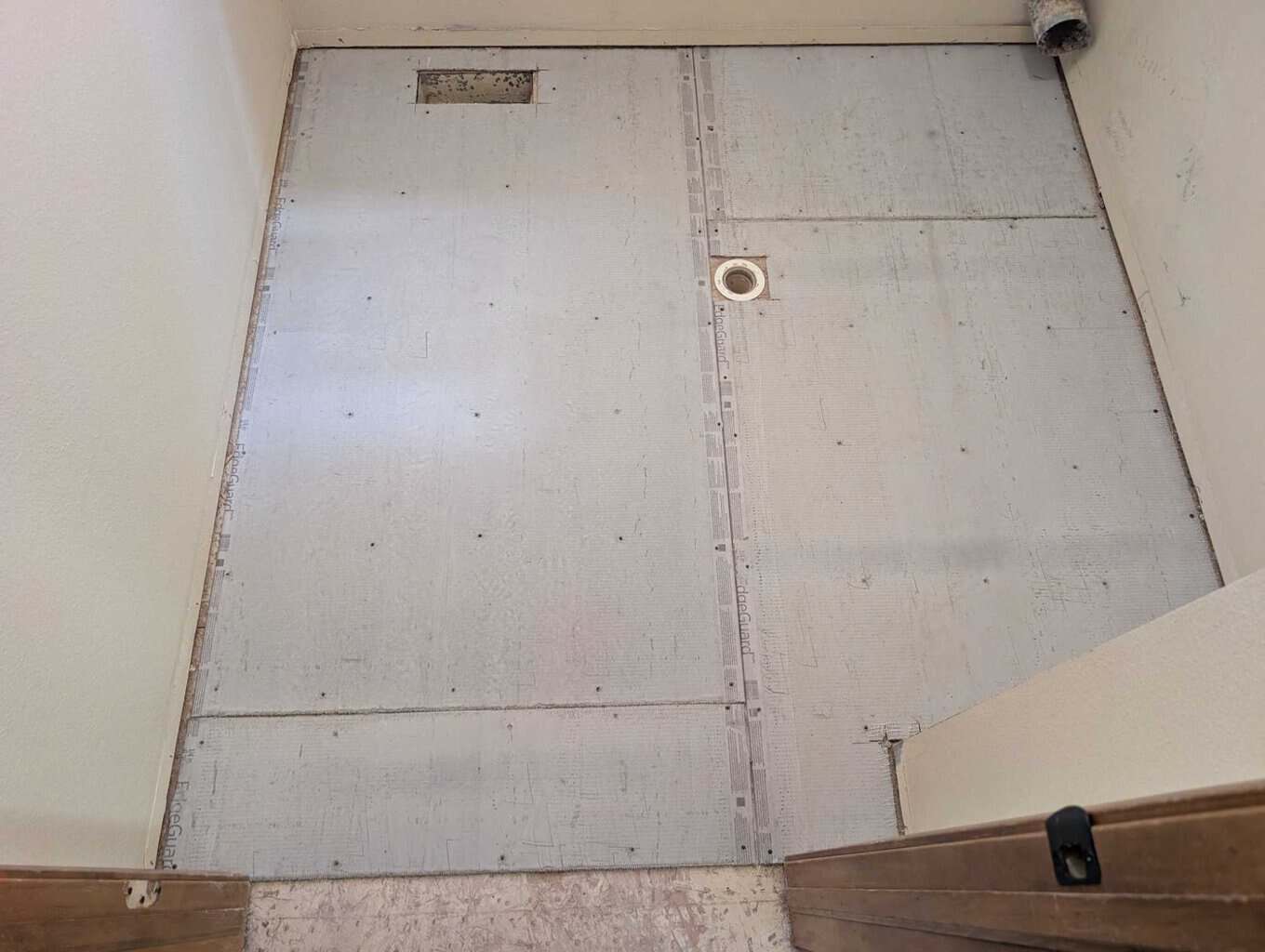 Laundry underlayment installed